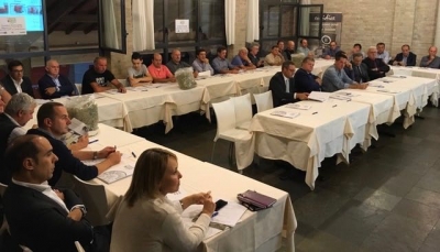 Incontro del Consorzio Agrario di Parma su Parmigiano Reggiano di qualità, alimentazione Non Ogm e filiera corta